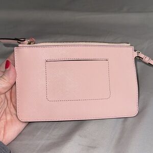 Kate Spade pale pink medium zip wristlet, like new condition